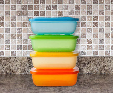 Colourful containers stacked on top of each other.