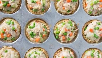 Mini turkey pot pies with peas, mashed potatoes and carrots.